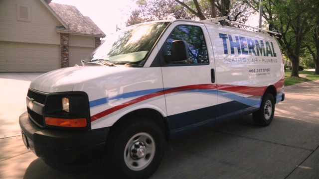 A White Thermal Services Van For Cooling & Heating repair and replacement.