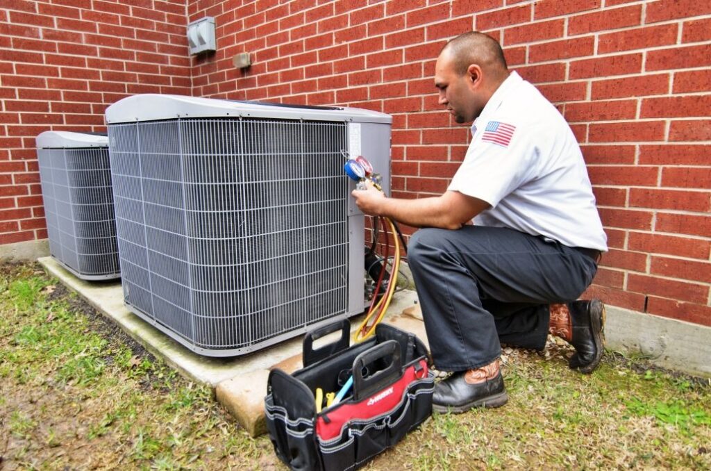 HVAC technician performing an AC tune-up